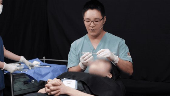 A medical aesthetics treatment in progress